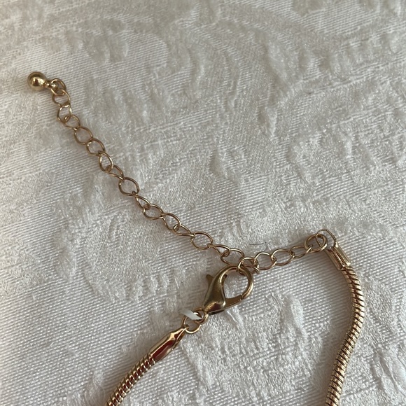 Open Shiny Gold-Tone Triple Oval Pendant on 16” Soft Snake Chain - Picture 6 of 6